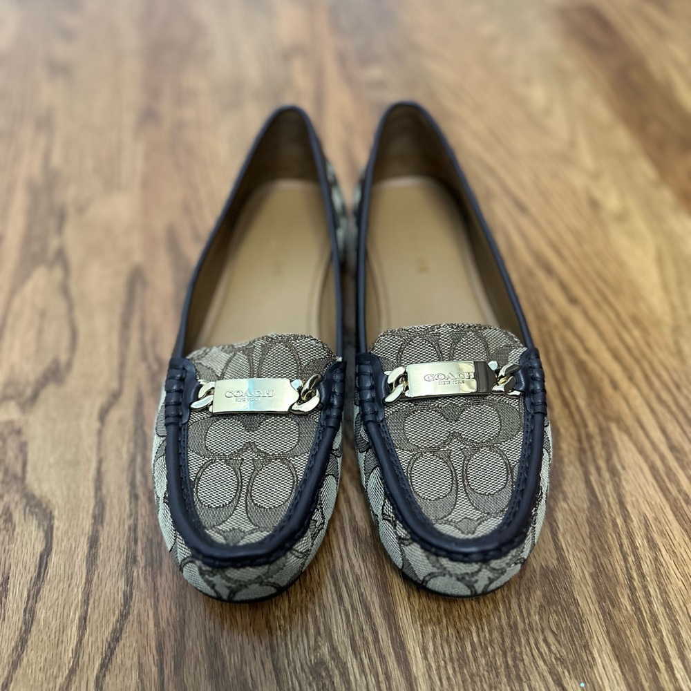 Coach Brown Flats with Elegant Metal Accents